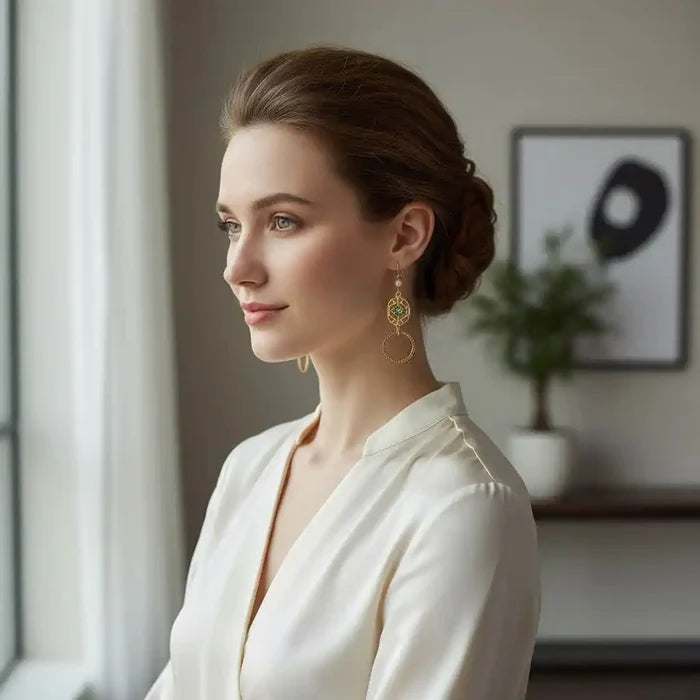 Model showcasing 14 KT Gold Filled Green Crystal Circle Filigree Earrings in elegant setting.