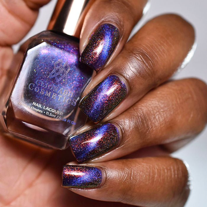 Close up of nails done with Acid Rain Nail Lacquer on deep skin tone