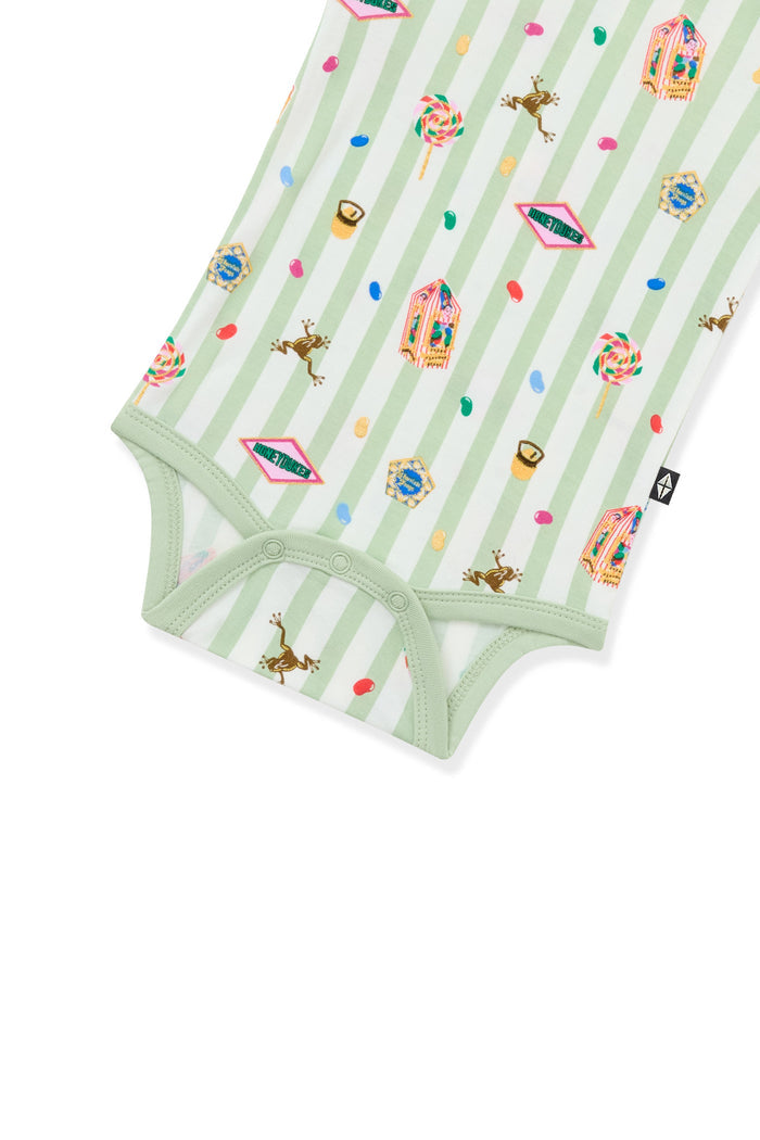 Bottom part of Green and white striped bodysuit with colorful Harry Potter patterns on a white background