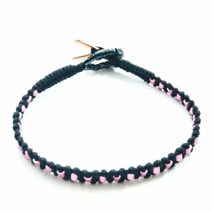 Copper Ribbon Black Pink Braided Breast Cancer Bracelet with black and pink braided design and copper accents.