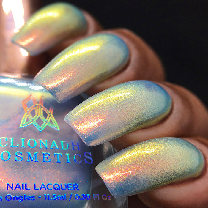 Bottom angled picture of Hilt Nail Lacquer on medium skin tone.
