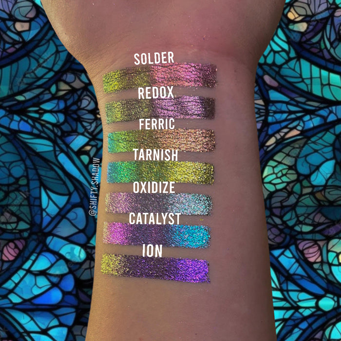 Arm swatches of Solder, Redox, Ferric, Tarnish, Oxidize, Catalyst and Ion on fair skin tone.
