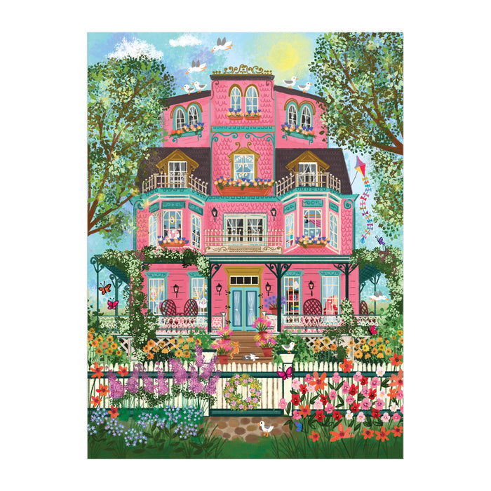 Experience the Joy Laforme Capeside Victorian 1000 Piece Foil Puzzle, featuring a vibrant pink Victorian mansion with lush gardens, blooming flowers, green trees, birds, and a sunny white picket fence scene by Joy Laforme.