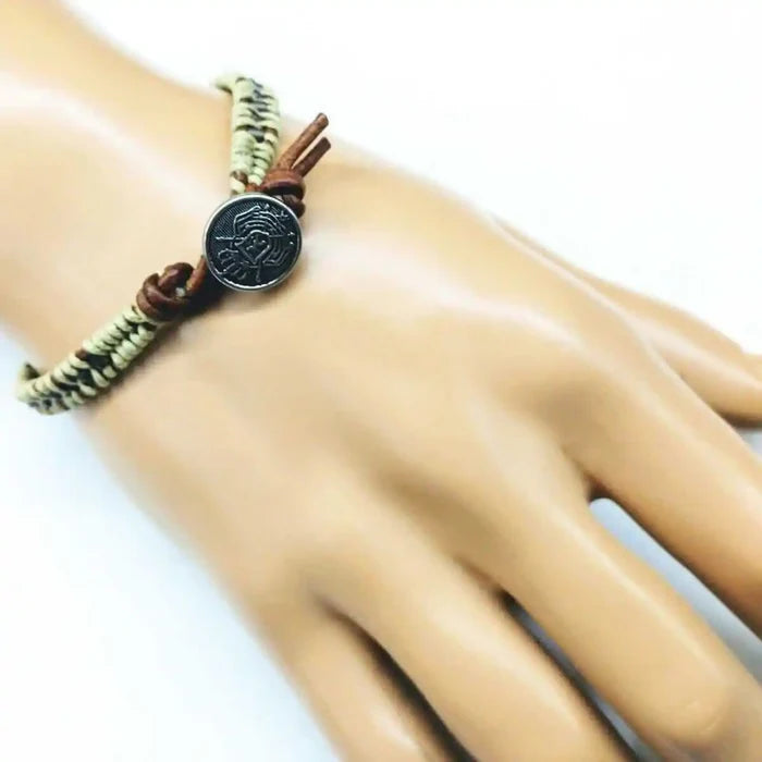 Leather Seed Bead Rattlesnake Tail Weave Bracelet worn on a hand, showcasing unique weaving and detail.