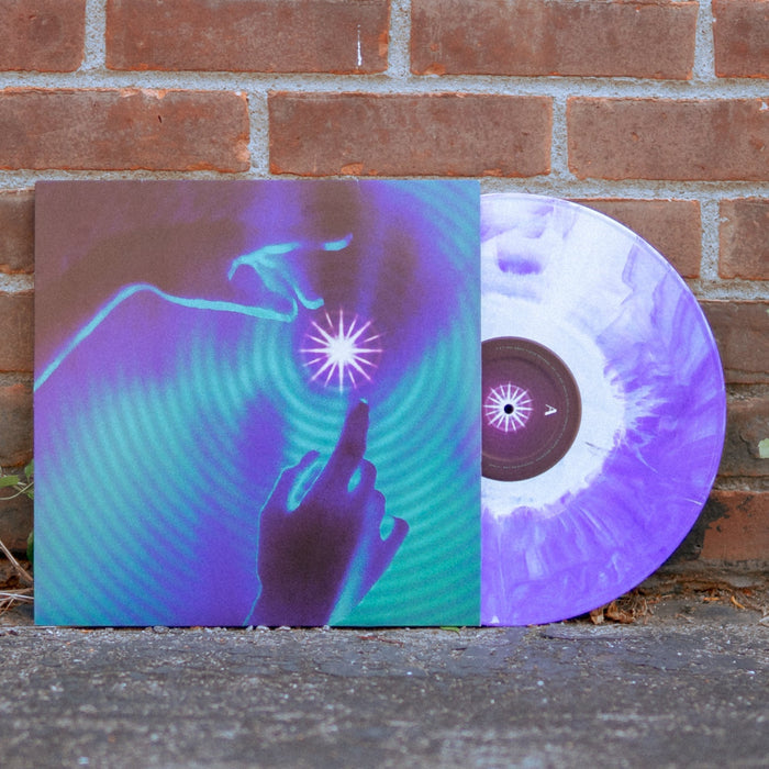 Vinyl jacket with a drawing of two hands reaching for a star. Around the star and covering the whole album cover is a ripple effect drawn in purple and green. Peeking out of the vinyl jacket is a clear and purple vinyl.