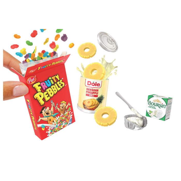 Fruity Pebbles cereal box, Dole pineapple juice, and Boursin cheese on a white background