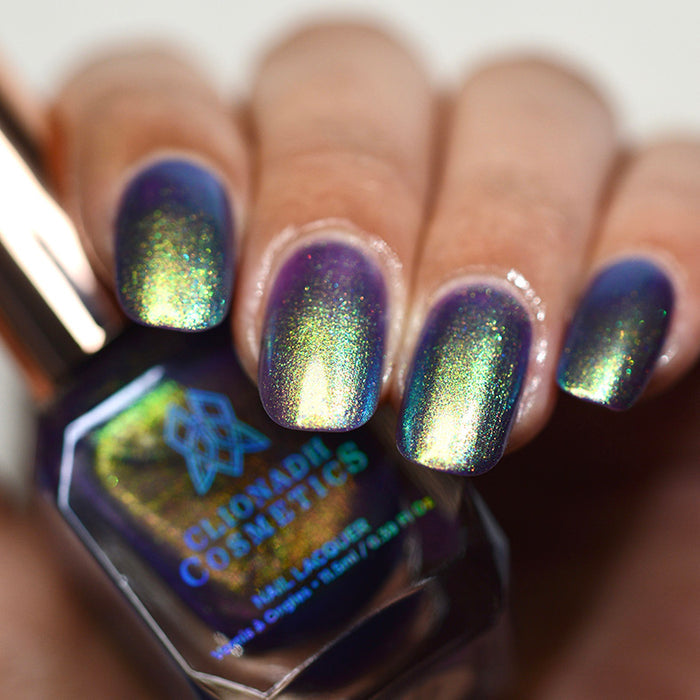 Close up of nails done with Niello nail lacquer on medium skin tone.