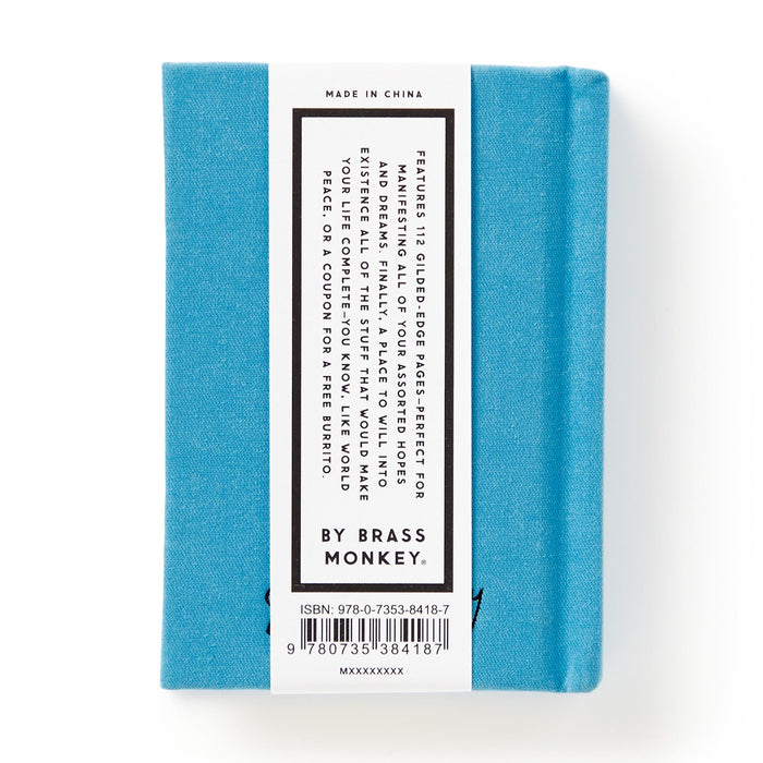 A small blue hardbound book titled Tiny Hopes and Dreams Tiny Diary by Brass Monkey, made in China, with a white label on the back containing a description, barcode, and ISBN.