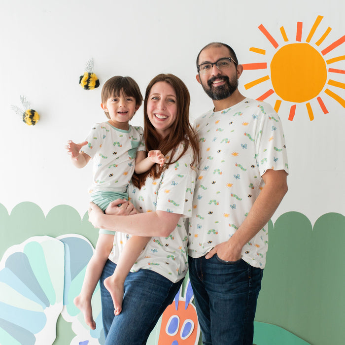 Family wearing matching Kyte Baby tees in The Very Hungry Caterpillar™ and Friends