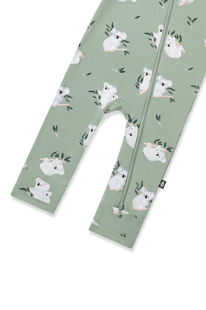 Zipper closure shown on the leg of the Zippered Romper in Koala