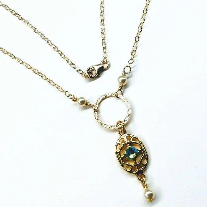 14 K Gold-Filled Hammered Open Circle Filigree Necklace showcasing intricate filigree and elegant design with pearls.