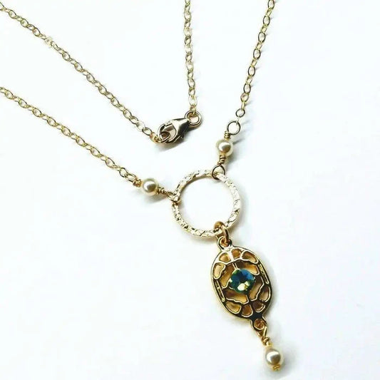 14 K Gold-Filled Hammered Open Circle Filigree Necklace showcasing intricate filigree and elegant design with pearls.