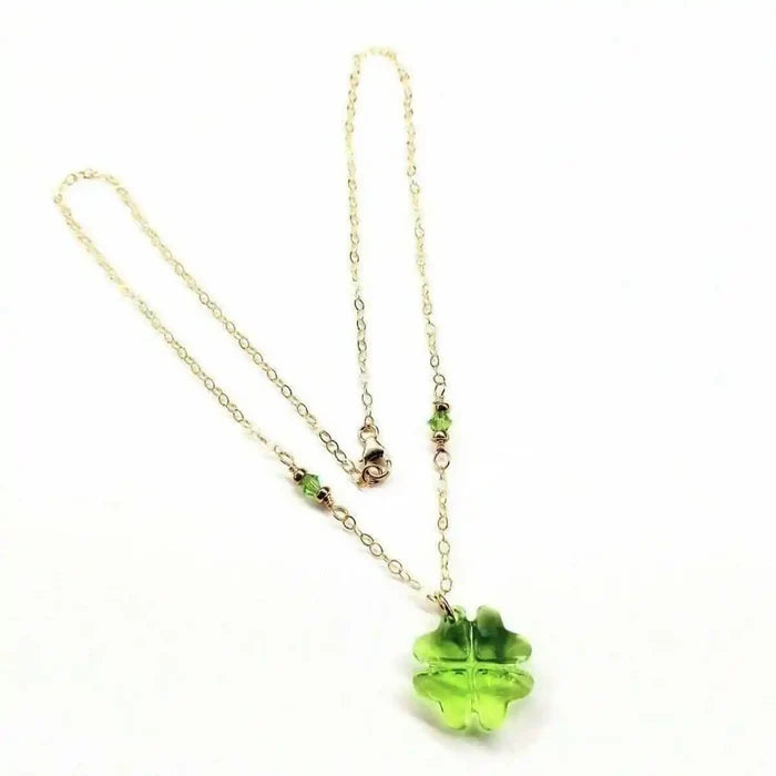 14 K Gold Filled Light Green Crystal Clover Necklace with shimmering four-leaf clover pendant and delicate chain.