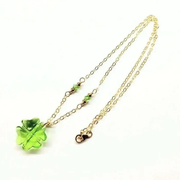 14 K Gold Filled Light Green Crystal Clover Necklace featuring a Peridot-colored Swarovski Crystal pendant.