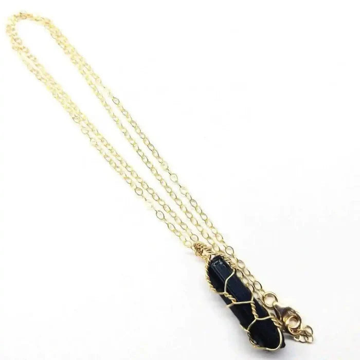 14 K Gold Filled Wire Wrapped Raw Black Tourmaline Necklace showcasing elegant design and natural black tourmaline stone.