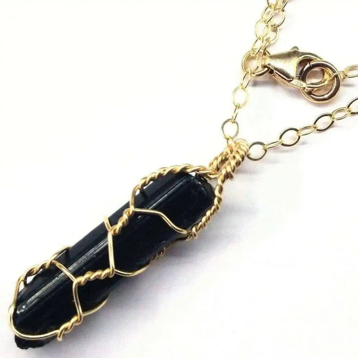 14 K Gold Filled Wire Wrapped Raw Black Tourmaline Necklace showcasing unique design and craftsmanship.