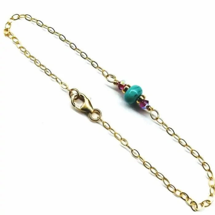 14K Gold Filled Pink and Turquoise Gemstone Dainty Bracelet featuring vibrant gemstones and gold-filled chain.