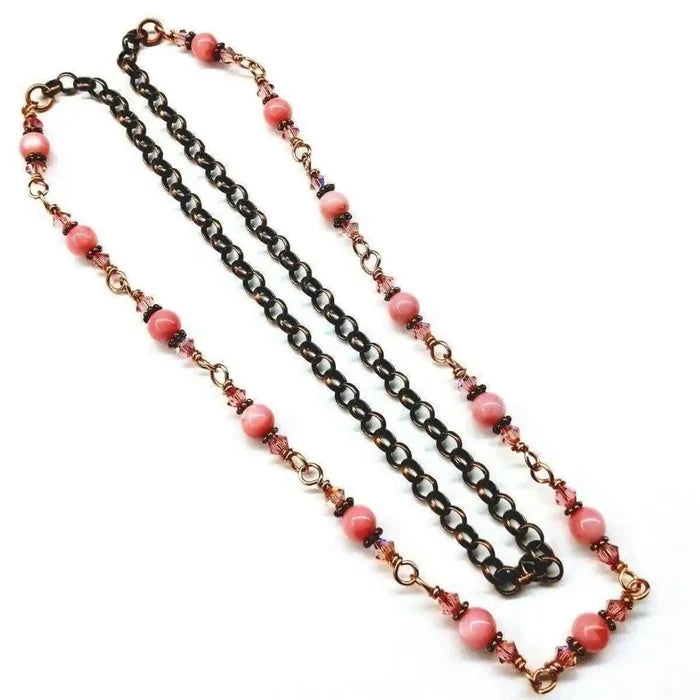 24-Inch Copper Peach Pearl Crystal Wire Wrapped Necklace featuring peach mother of pearl and sparkling Swarovski crystals.