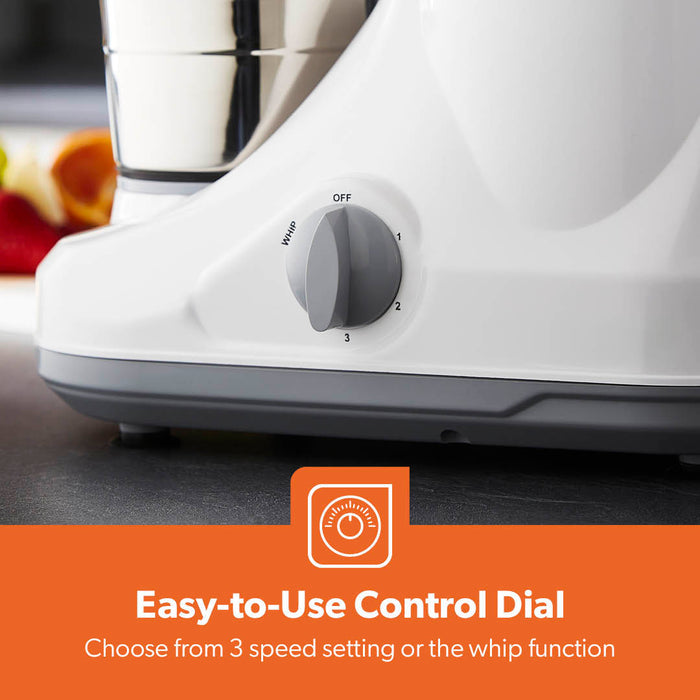 3-In-1 mixer grinder on top of a kitchen countertop showing off the easy to use control dial with three speed control.