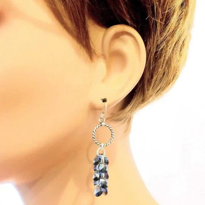 925 Silver Denim Blue Cascading Crystal Cluster Earrings showcasing a stylish design on a mannequin's ear.