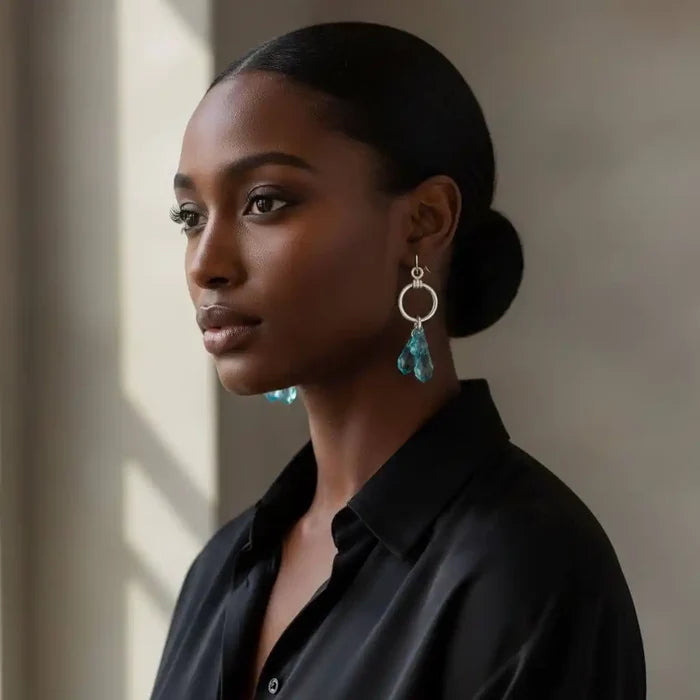 925 Silver Hammered Aqua Crystal Cascading Drop Earrings worn by a model, highlighting their beauty and craftsmanship.