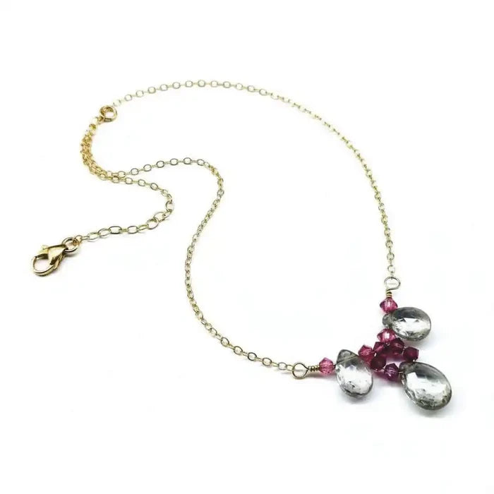 Adjustable Gold Filled Wire Wrapped Gemstone Necklace featuring rainbow quartz and fuchsia Swarovski crystals.