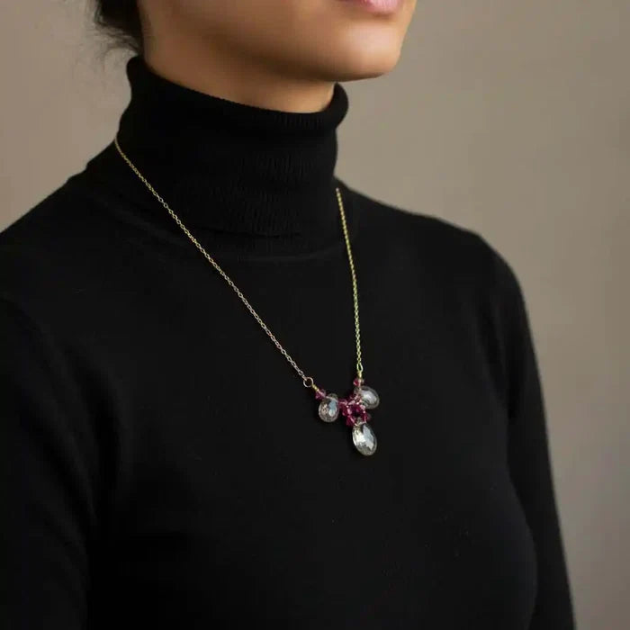Adjustable Gold Filled Wire Wrapped Gemstone Necklace worn by model, featuring rainbow quartz briolette and fuchsia Swarovski crystals.