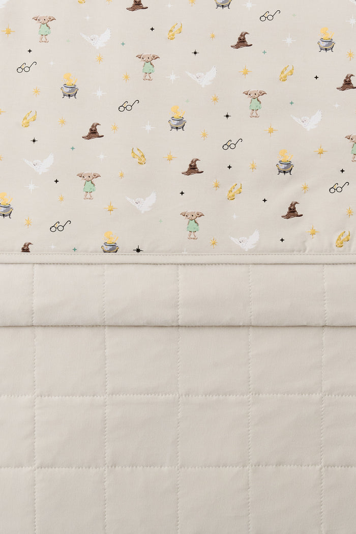 Beige Adult Blanket with Harry Potter pattern print with plain beige fabric at the back