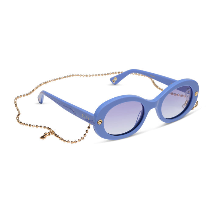 diff eyewear x disney alice in wonderland alice round sunglasses in a periwinkle blue acetate frame and periwinkle blue gradient lenses angled view