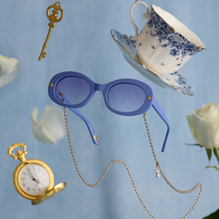 still life - diff eyewear x disney alice in wonderland alice round sunglasses with tea cup, key and watch