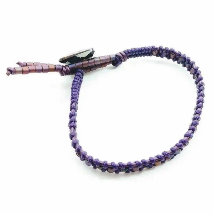 Amethyst Braided Leather Swarovski Crystal Button Bracelet showcasing a unique braided design with elegant crystals.