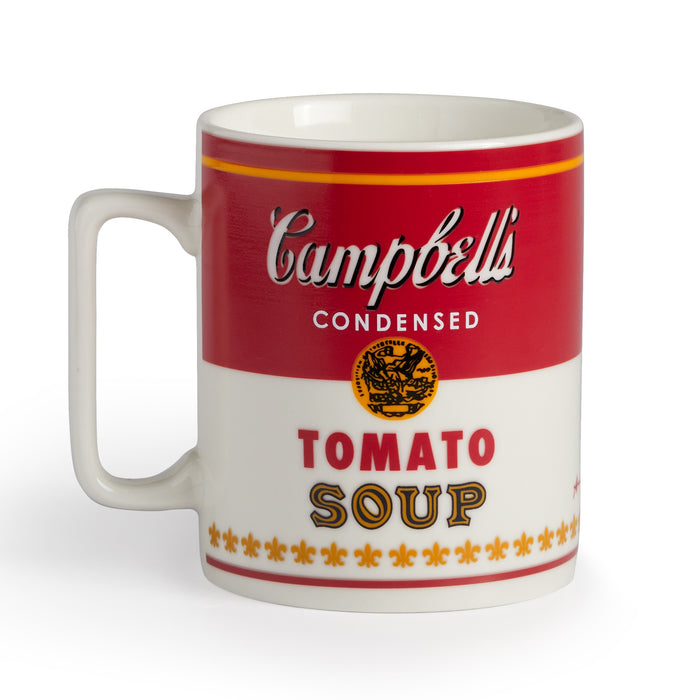 The Andy Warhol Soup Can Color Changing Ceramic Mug by Andy Warhol features a design inspired by Campbell’s Condensed Tomato Soup, with red, white, and yellow colors and the iconic logo—a tribute to Warhol’s classic pop art.