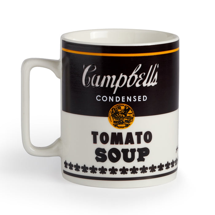 The Andy Warhol Soup Can Color Changing Ceramic Mug by Andy Warhol features bold text and decorative details inspired by Warhol’s iconic soup can design, with black, white, and yellow accents reminiscent of the Campbell’s Tomato Soup can.