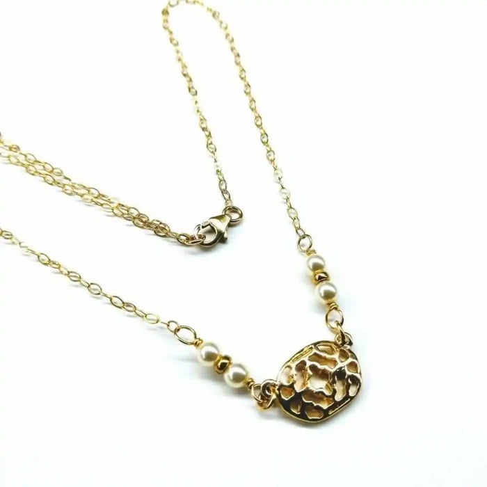 As Seen on Molly Ringwald Gold Filled Pearl Choker Necklace featuring a delicate gold chain and pearl accents.