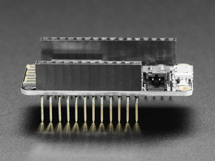 Assembled Feather HUZZAH w/ ESP8266 WiFi With Stacking Headers by Adafruit - The Pi Hut