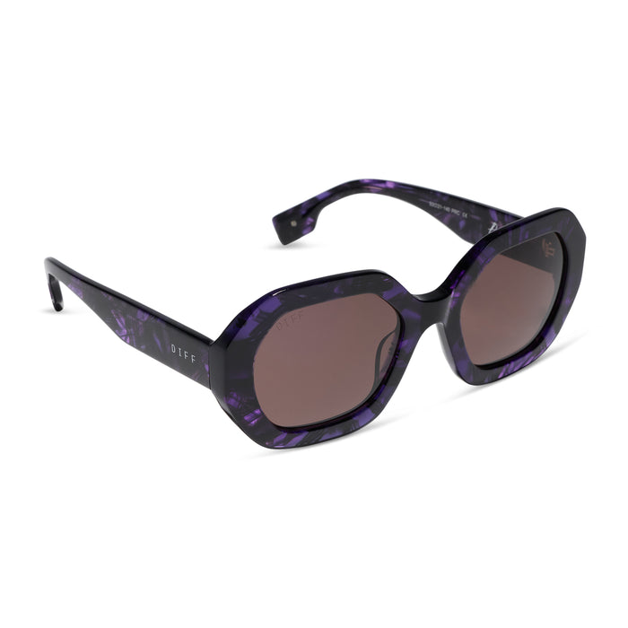 diff eyewear x practical magic 2 featuring the aunt jet round sunglasses with a purple tortoise frame and brown lenses angled view