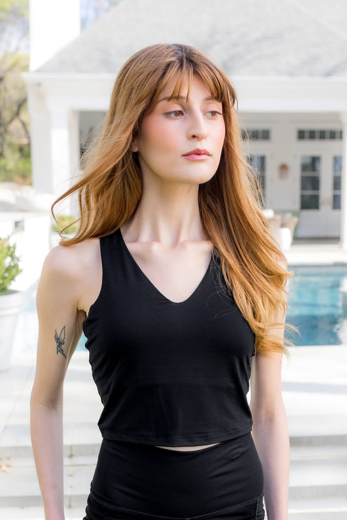 Female modeling the Bamboo Flex Bra Tank in Midnight