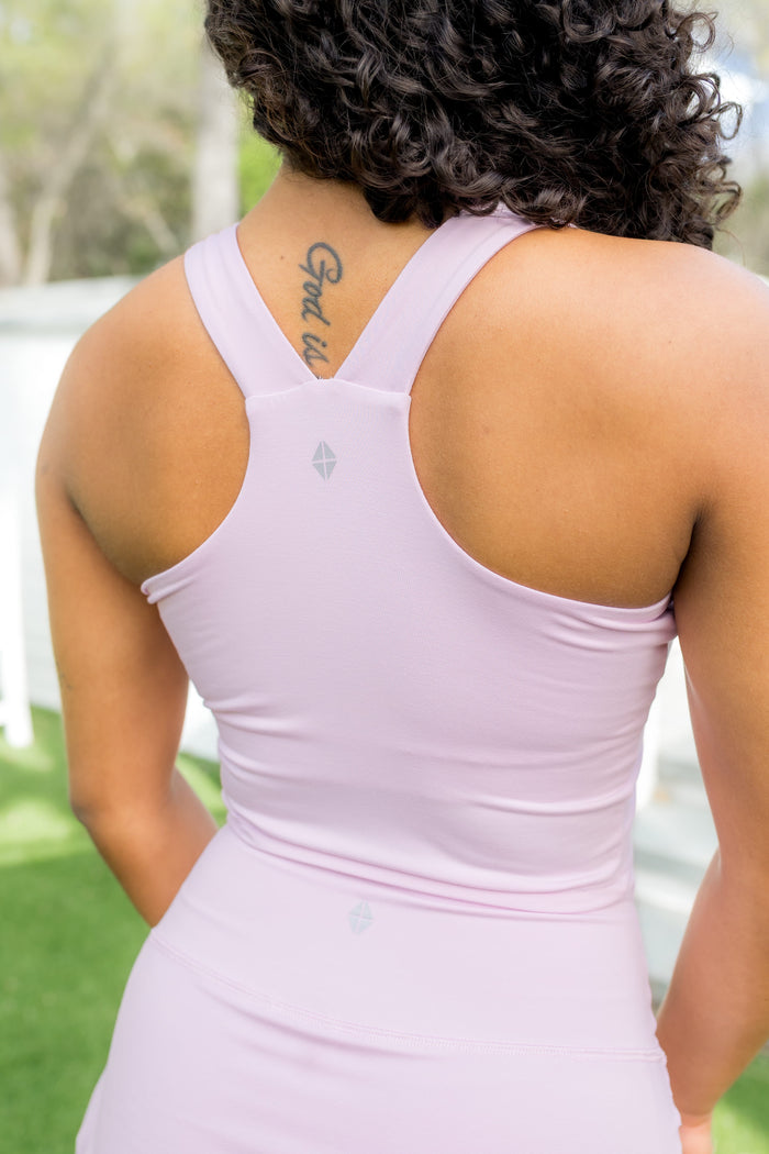 Close up of the back of the Bamboo Flex Bra Tank in Thistle with the Kyte baby logo visible