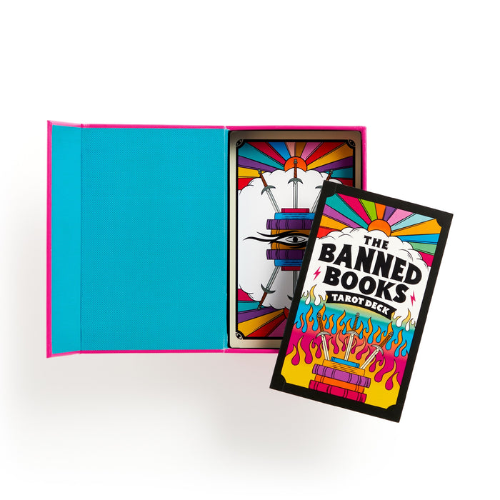 The Banned Books Tarot Card Set by Castle Point features a vibrant deck and booklet in an open box with a bright teal interior. Perfect for book lovers, the cards and cover display colorful illustrations of books and flames.