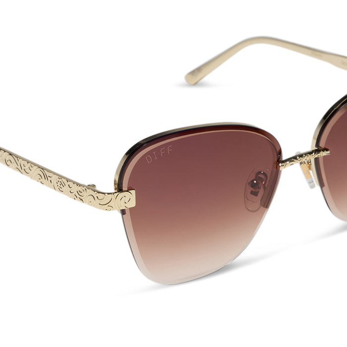 diff eyewear x disney princess featuring the belle 3.0 cateye sunglasses with a metal gold frame and brown gradient lenses detailed view