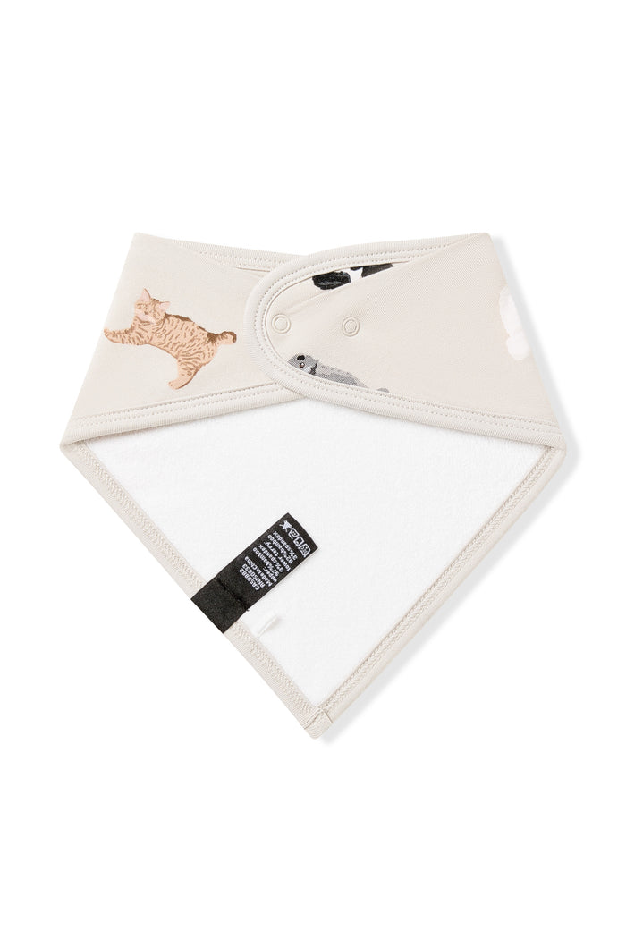 The back of the Bib in Fluffy Cat showing the snap closure and bamboo terry lining