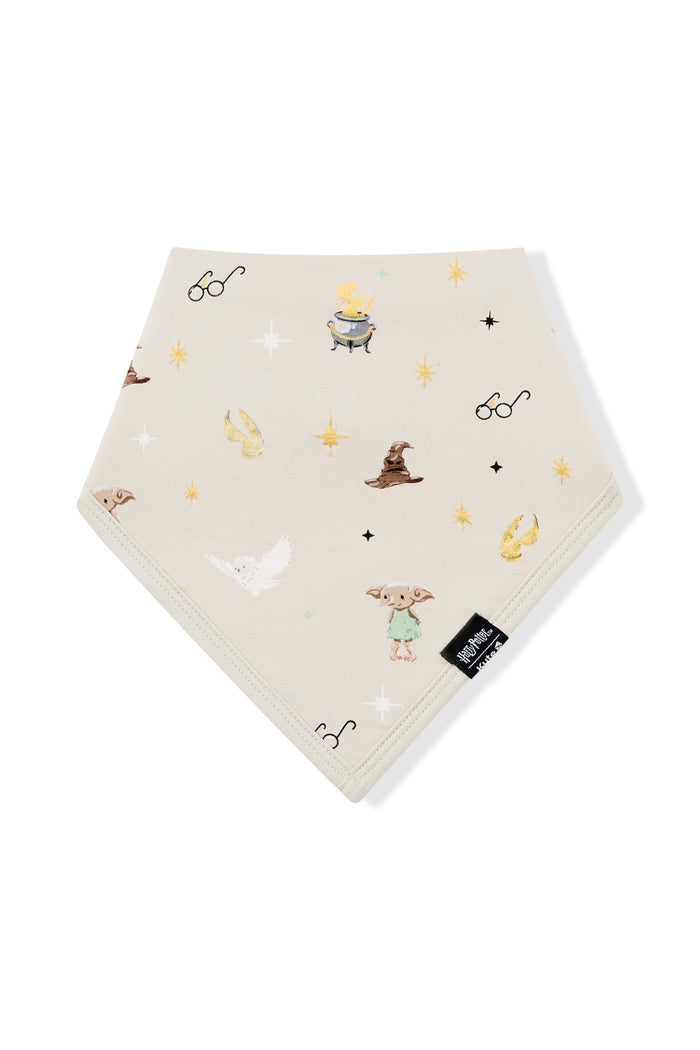 Beige bib with Harry Potter prints on a white background.
