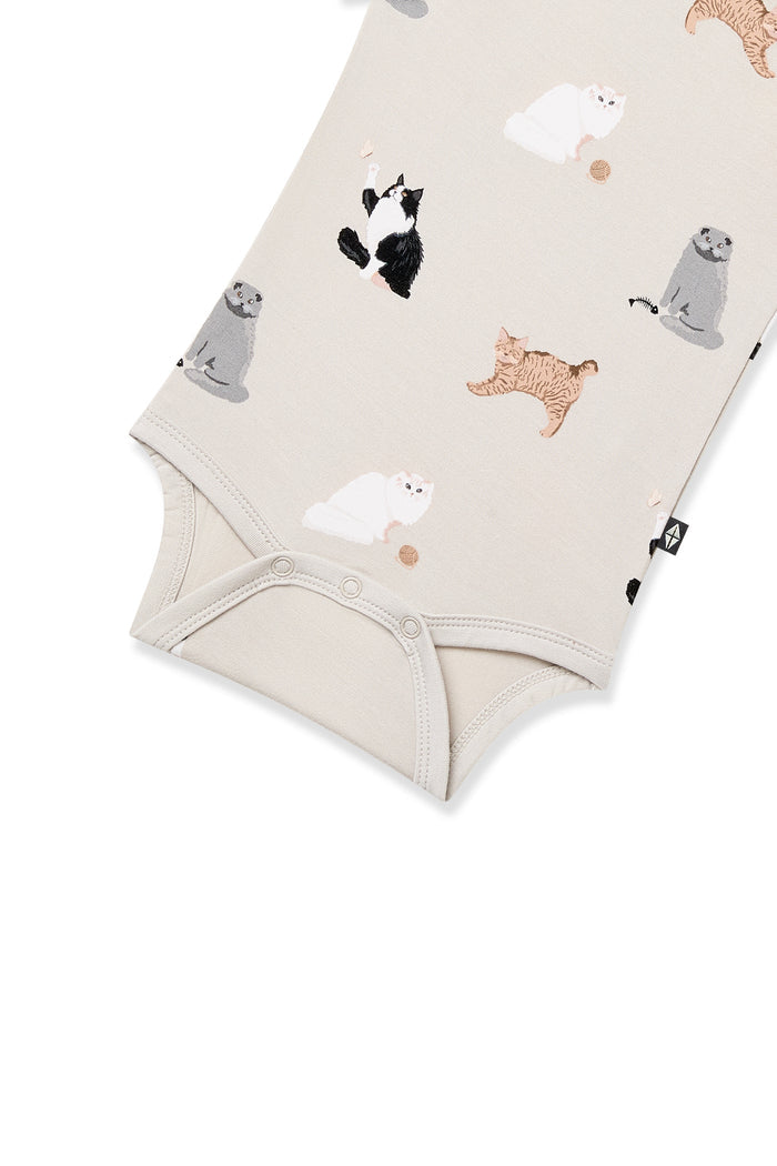 Close up of the snap closures on the Bodysuit in Fluffy Cat