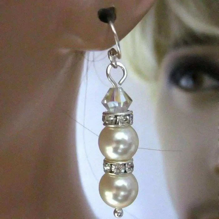 Bridal Sterling Silver Stacked Crystal and Pearl Earrings showcasing lustrous pearls and sparkling crystals.