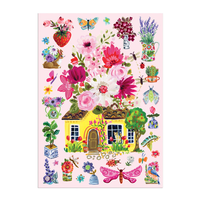 A vibrant illustration of a yellow cottage topped with flowers, surrounded by butterflies and garden details on pink, features on the Buzzy Bouquets Greeting Card Puzzle by Jennifer O Lewis / August Wren.
