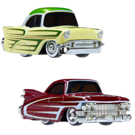 Two vintage car models, one yellow and green, the other red and white, on a white background.