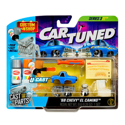 Packaged toy car with accessories and tools on a white background