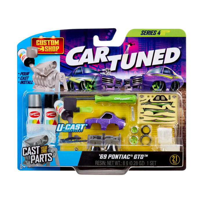 CarTuned toy, model car set packaging with purple car base and accessories on a white background