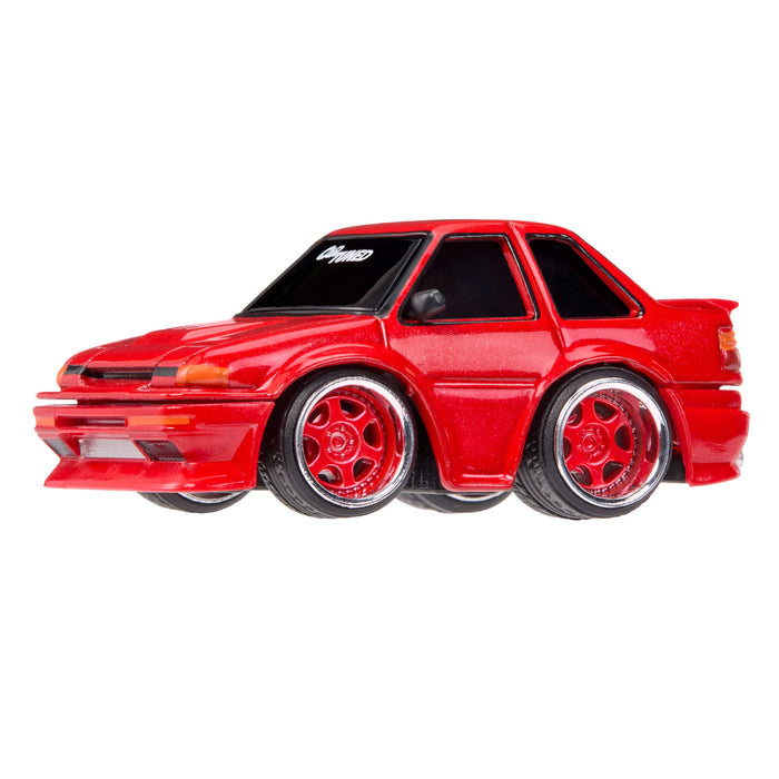 Red toy car with red wheel rims on a white background