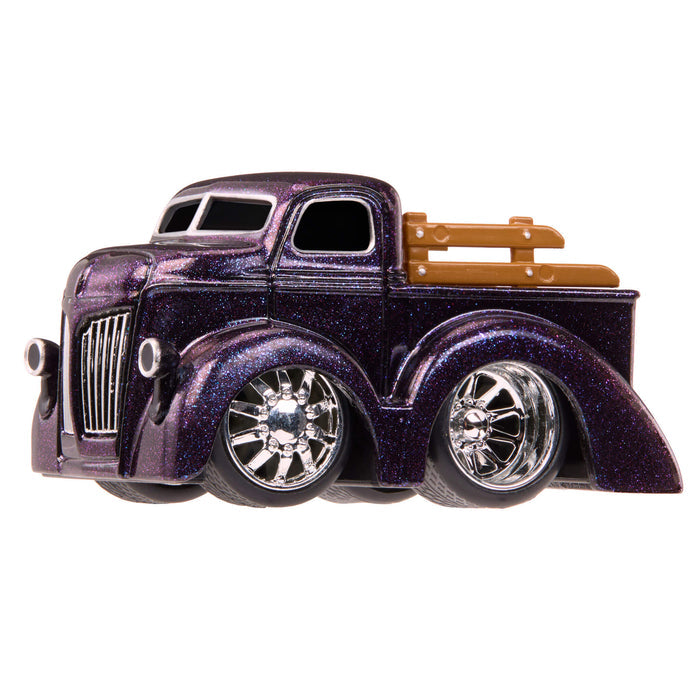 Purple, speckled truck with silver wheel rims on white background